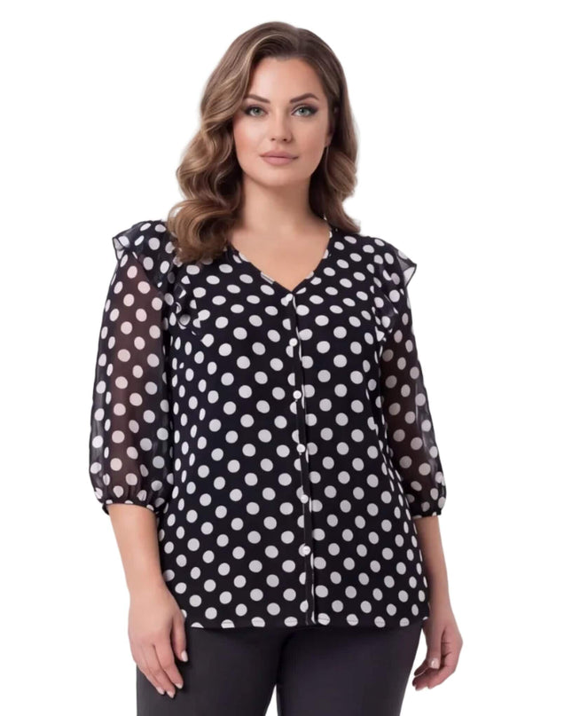 Επίσημη γυναικεία σκούρα μπλε τουνίκ με λευκό πουά σε μεγάλα μεγέθη. Μπροστινή όψη που αναδεικνύει τη λαιμόκοψη V και τα αέρινα 3/4 μανίκια.