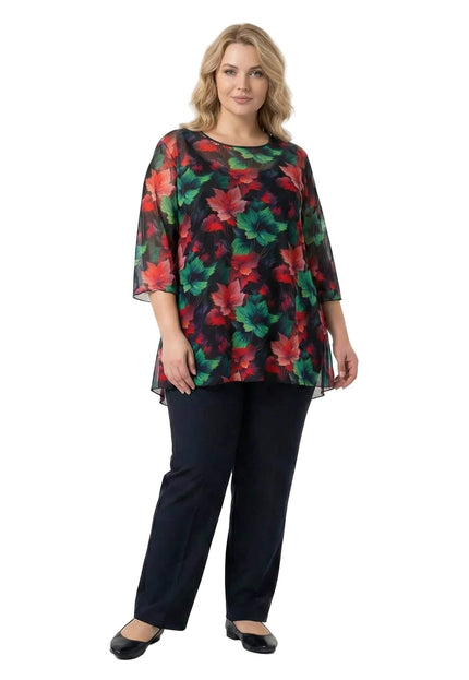 Επίσημη ριχτή τουνίκ δύο τεμαχίων plus size σε μαύρο χρώμα με πολύχρωμα μοτίβα φύλλων και αέρινο σιφόν, σε ολόσωμη λήψη με λευκό φόντο.