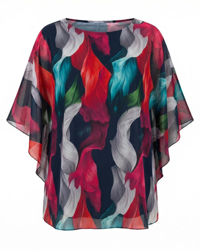 Επίσημη τουνίκ από σιφόν σε μεγάλα μεγέθη με εντυπωσιακό πολύχρωμο αφηρημένο μοτίβο και φαρδιά μανίκια, σε λευκό φόντο.