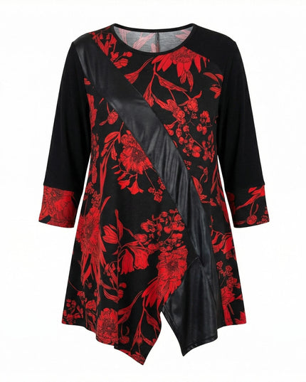 Επίσημη μαύρη τουνίκ με κόκκινα λουλούδια και διαγώνια φάσα δερματίνης, σε ασύμμετρη γραμμή για μεγάλα μεγέθη, φωτογραφημένη σε λευκό φόντο.