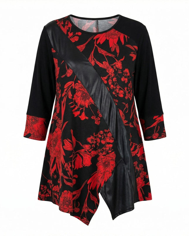 Επίσημη μαύρη τουνίκ με κόκκινα λουλούδια και διαγώνια φάσα δερματίνης, σε ασύμμετρη γραμμή για μεγάλα μεγέθη, φωτογραφημένη σε λευκό φόντο.