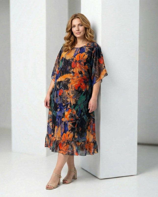 Ολόσωμη λήψη από επίσημο αέρινο εβαζέ φόρεμα σιφόν με χρωματιστό σχέδιο και φαρδιά μανίκια, ιδανική επιλογή για μεγάλα μεγέθη.