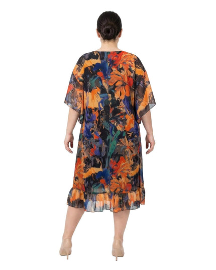 Πίσω όψη επίσημου αέρινου εβαζέ φορέματος από σιφόν σε μεγάλα μεγέθη, με πολύχρωμο σχέδιο και βολάν στο κάτω μέρος.