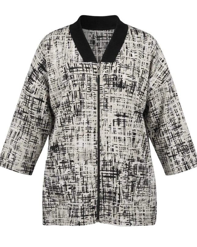 Γυναικεία μπεζ plus size ζακέτα με μαύρο αφηρημένο σχέδιο, ριμπ γιακά V και φερμουάρ. Μπροστινή όψη του ρούχου σε λευκό φόντο.