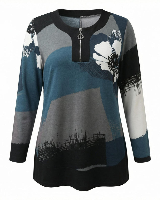 Καθημερινή τουνίκ μεγάλα μεγέθη με αφηρημένο μοτίβο σε πετρόλ και γκρι αποχρώσεις. Διαθέτει φερμουάρ στο λαιμό και μαύρο τελείωμα, σε λευκό φόντο.