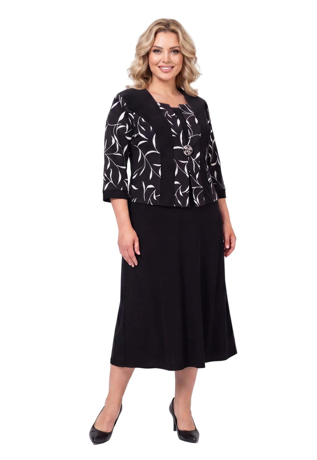 Μαύρο επίσημο φόρεμα μεγάλα μεγέθη με όμορφη καρφίτσα